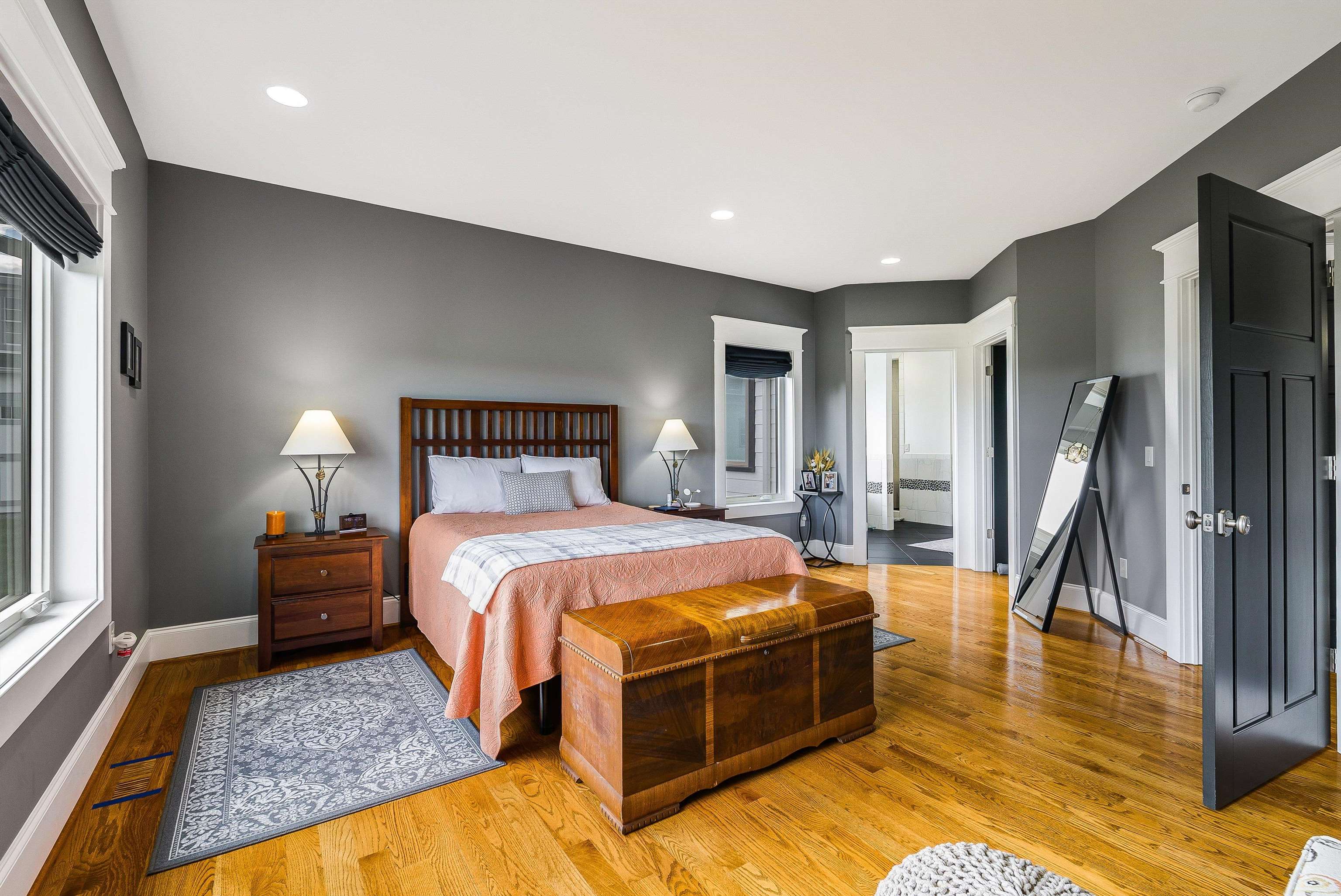 73 Bailey Road Fort Defiance, VA 24437 - Photo 34 of 73 a spacious bedroom with a bed and a chandelier