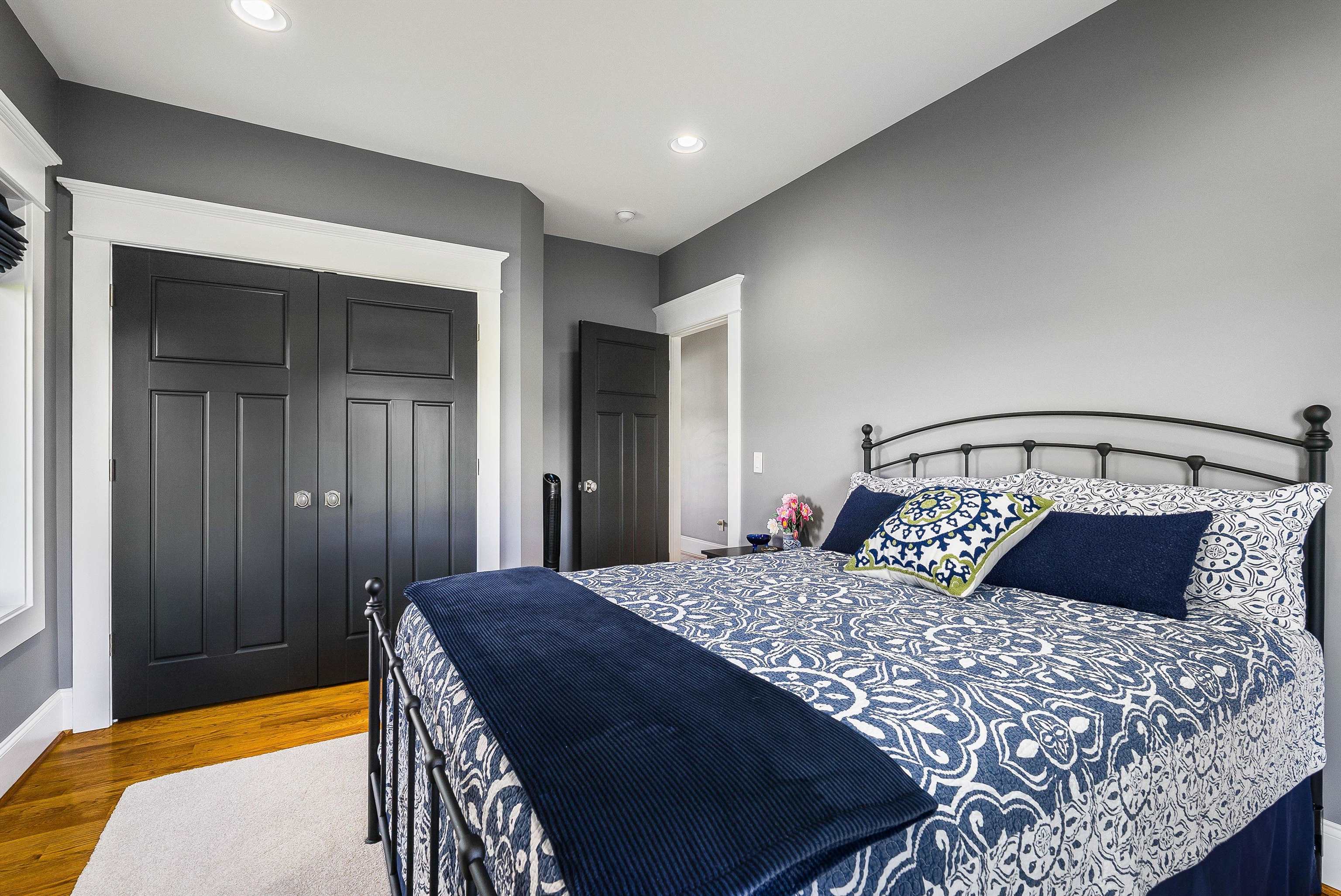 73 Bailey Road Fort Defiance, VA 24437 - Photo 45 of 73 a bedroom with a large bed and a chandelier