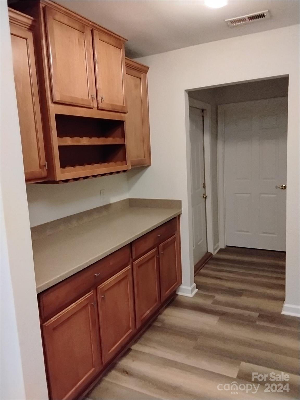 817 Ledgestone Court Fort Mill, SC 29708 - Photo 21 of 36 a kitchen with granite countertop cabinets stainless steel appliances and a window