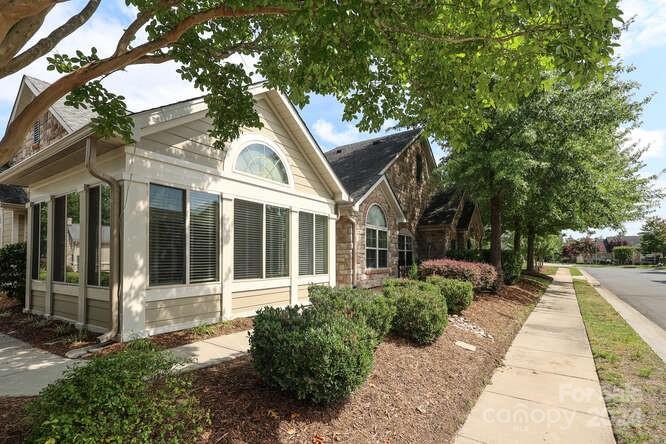 817 Ledgestone Court Fort Mill, SC 29708 - Photo 3 of 36 a view of a house with a garden