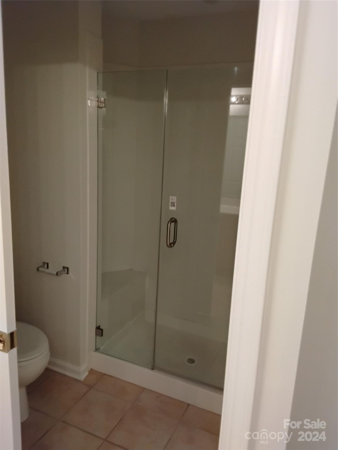 817 Ledgestone Court Fort Mill, SC 29708 - Photo 32 of 36 a bathroom with a shower and a toilet