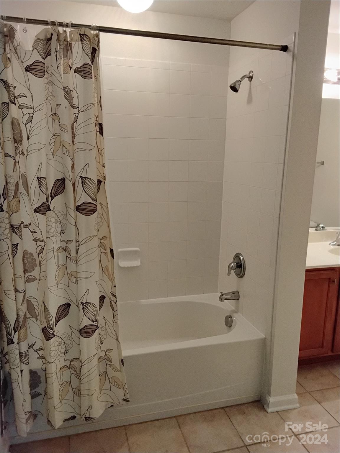 817 Ledgestone Court Fort Mill, SC 29708 - Photo 36 of 36 a bathroom with a bathtub and shower
