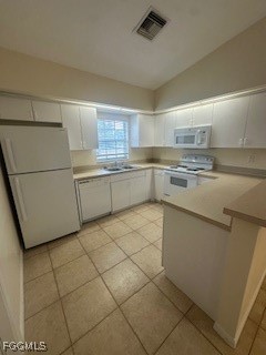 4546 28th Street Southwest Lehigh Acres, FL 33973 - Photo 3 of 9 a kitchen with a sink appliances and cabinets