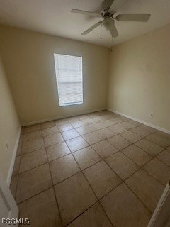 4546 28th Street Southwest Lehigh Acres, FL 33973 - Photo 8 of 9 en empty room with windows