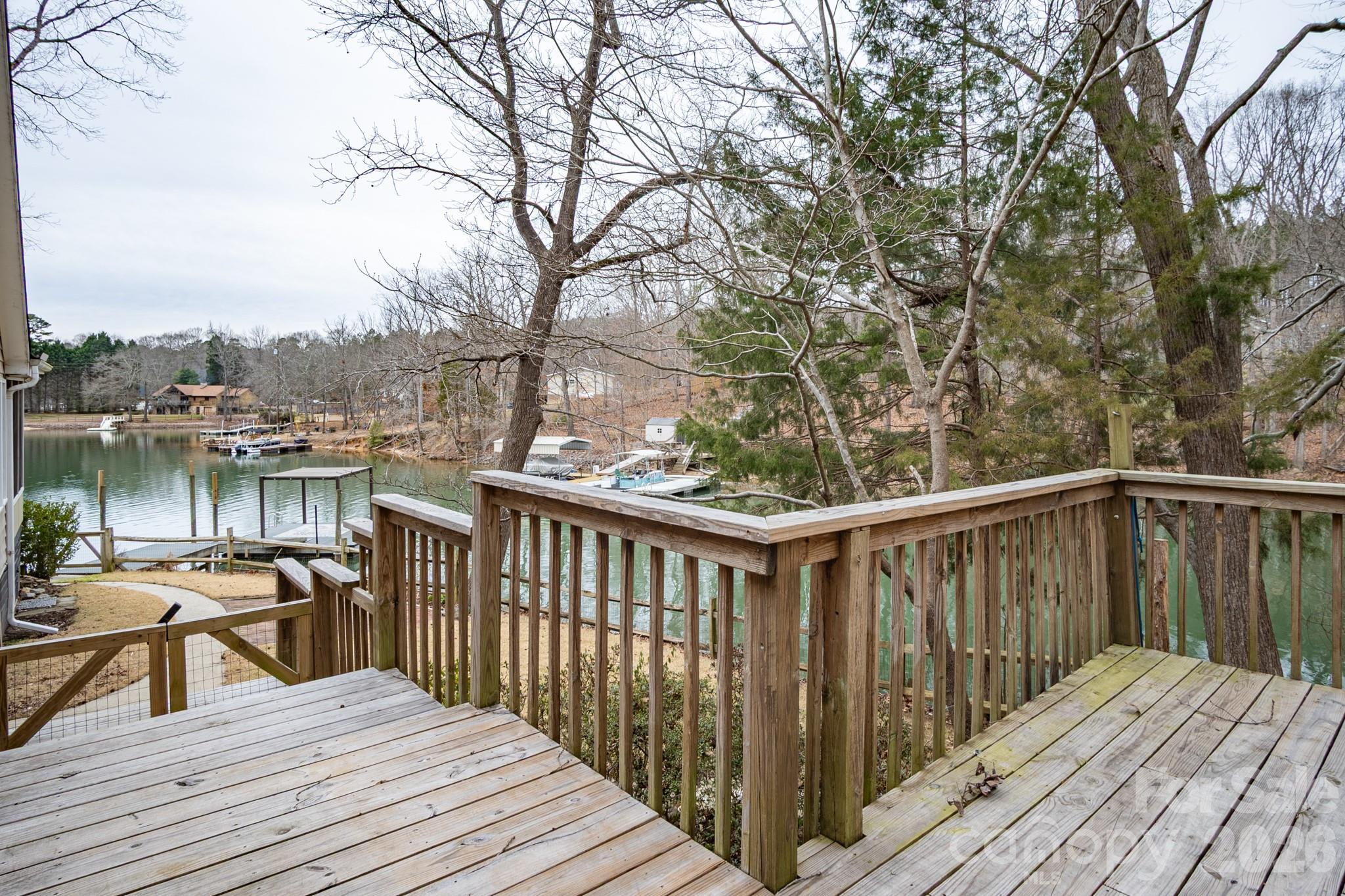 208 Island View Road Mount Holly, NC 28120 - Photo 19 of 37 a view of balcony with wooden floor and seating space