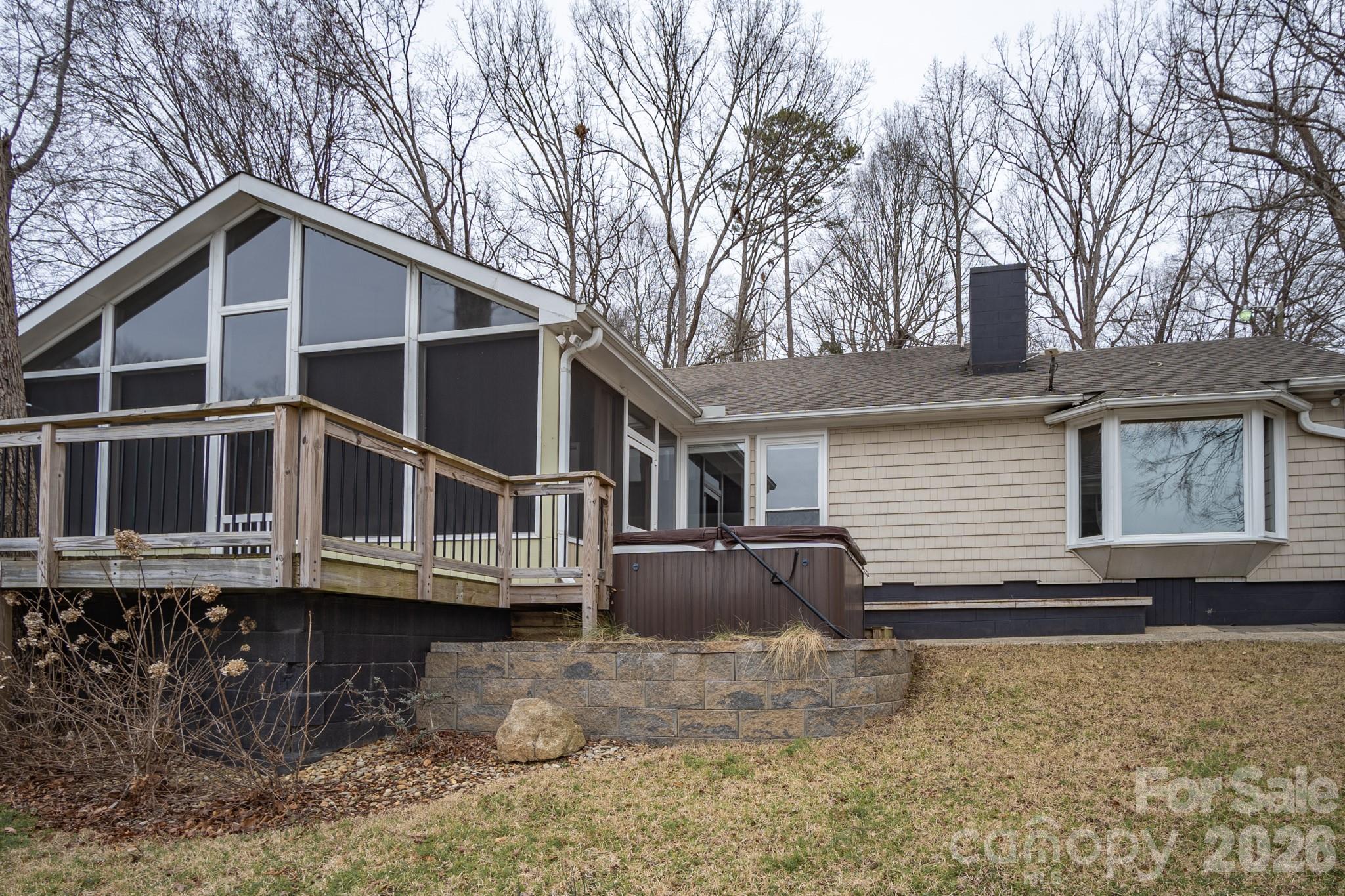 208 Island View Road Mount Holly, NC 28120 - Photo 2 of 37 a front view of a house with a yard