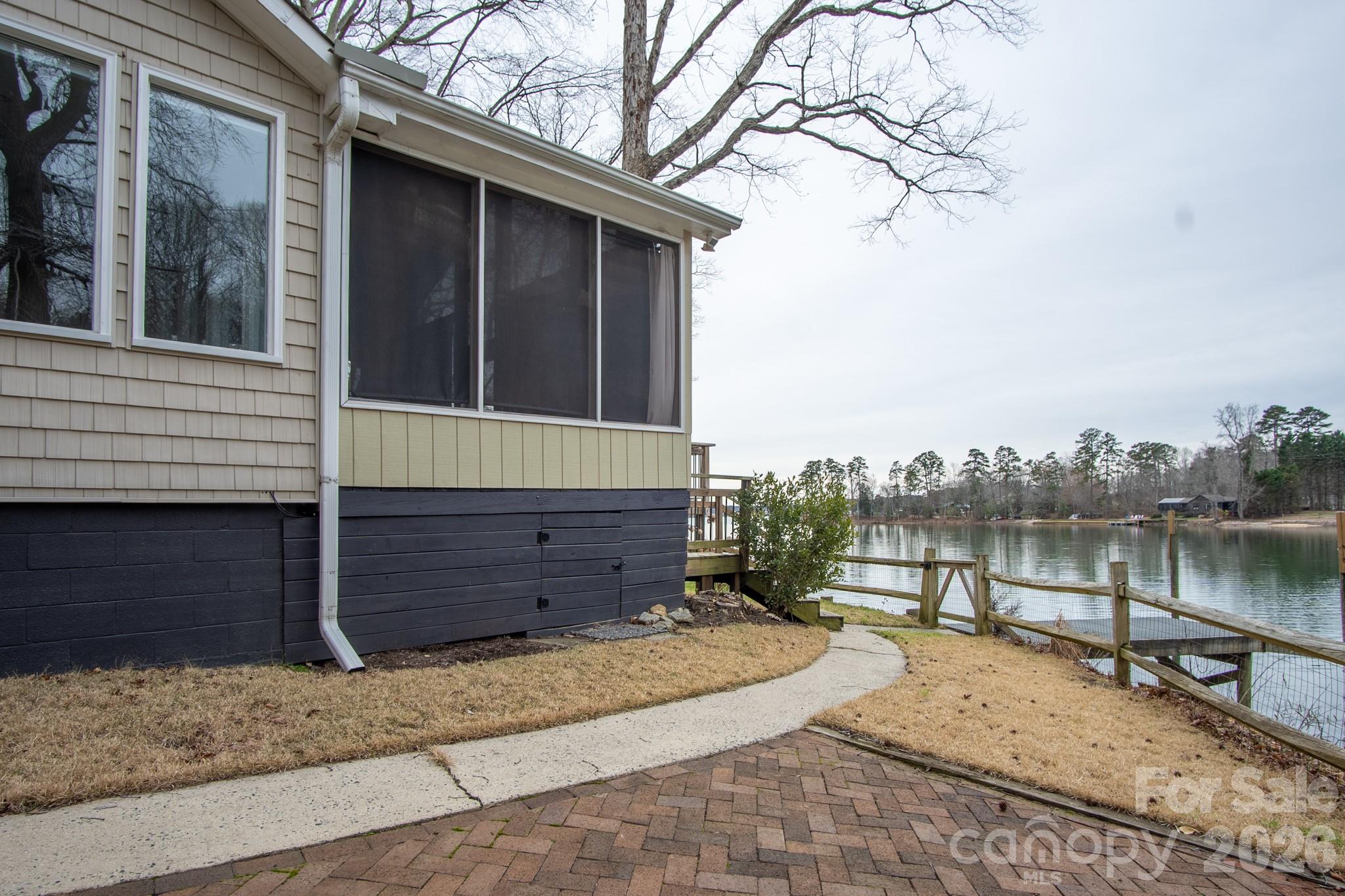 208 Island View Road Mount Holly, NC 28120 - Photo 21 of 37 a view of a house with a yard