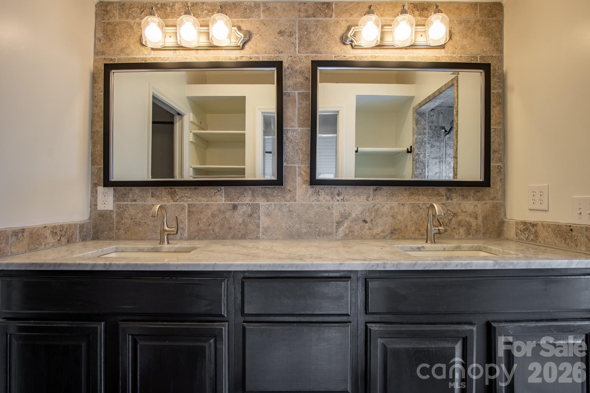 208 Island View Road Mount Holly, NC 28120 - Photo 37 of 37 a bathroom with a sink and a mirror