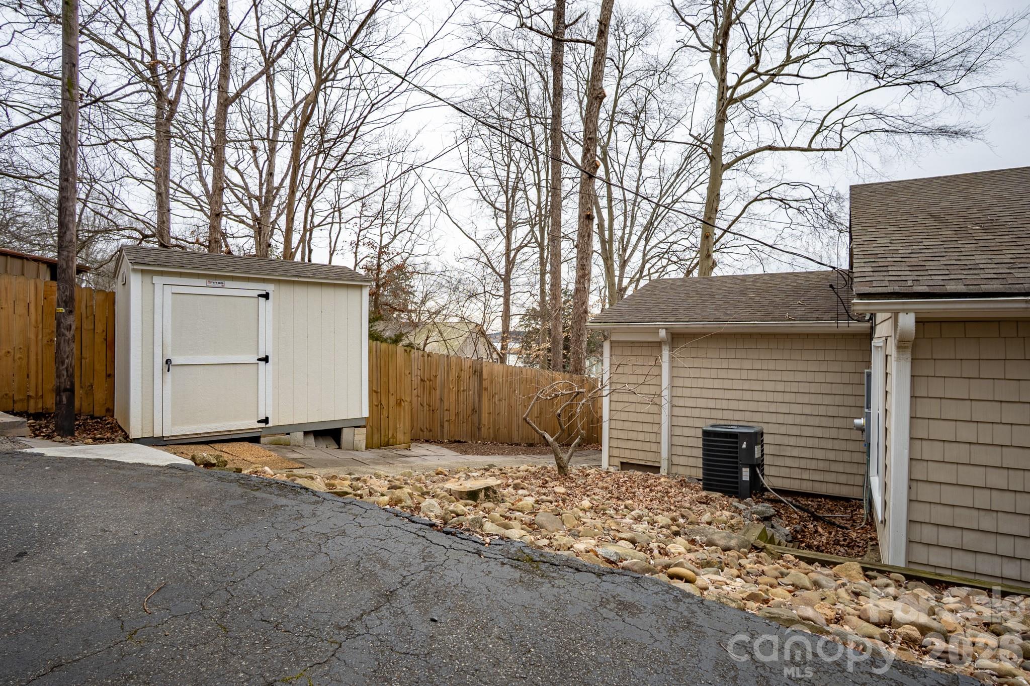 208 Island View Road Mount Holly, NC 28120 - Photo 10 of 37 a view of a house with a snow and yard