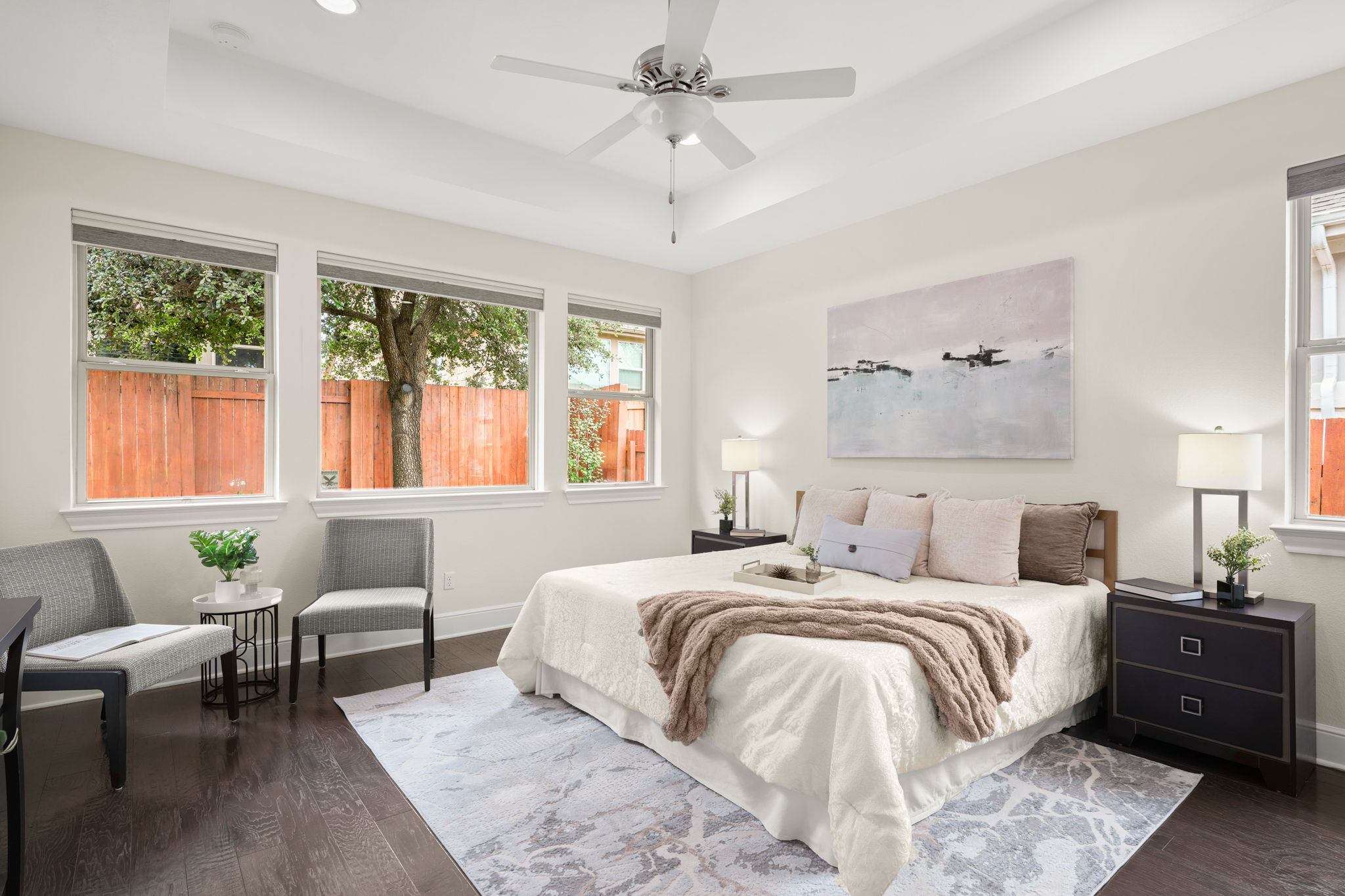 440 Cherokee Rose Circle Georgetown, TX 78626 - Photo 23 of 39 Hardwood flooring and multiple windows illuminate this cozy sleeping sanctuary.