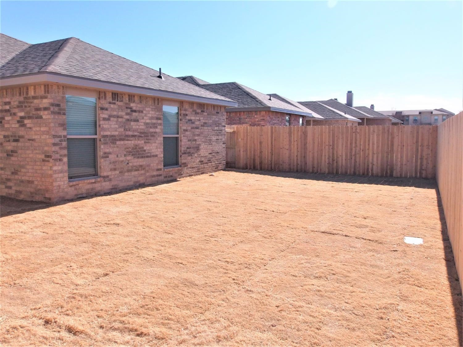 3712 Prentiss Avenue Lubbock, TX 79407 - Photo 22 of 23 a big house with wooden fence