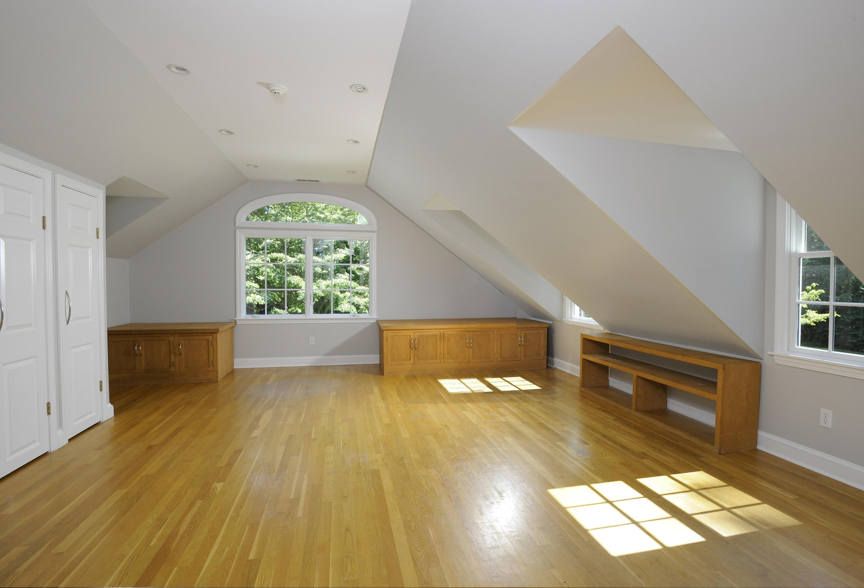 58 Locust Hill Road Darien, CT 06820 - Photo 15 of 21 wooden floor in an empty room with a window