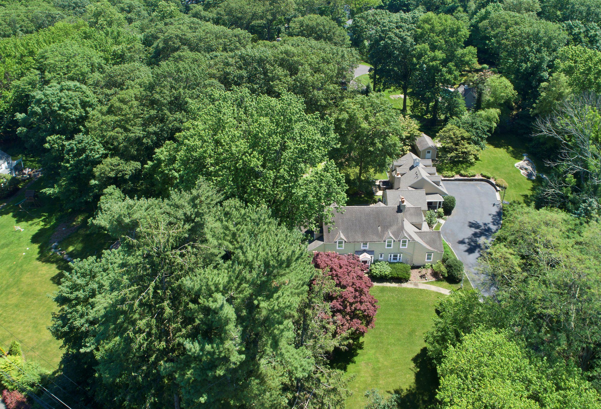 58 Locust Hill Road Darien, CT 06820 - Photo 2 of 21 an aerial view of a house with a yard