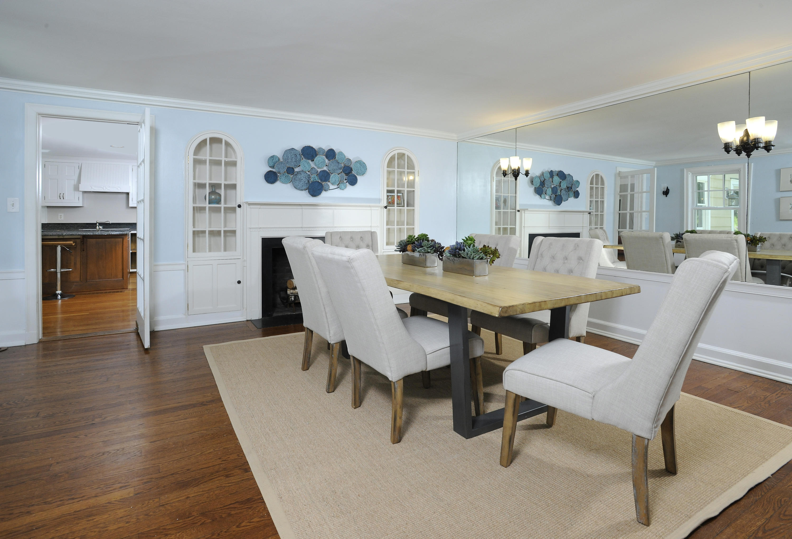 58 Locust Hill Road Darien, CT 06820 - Photo 7 of 21 a view of a dining room with furniture and wooden floor
