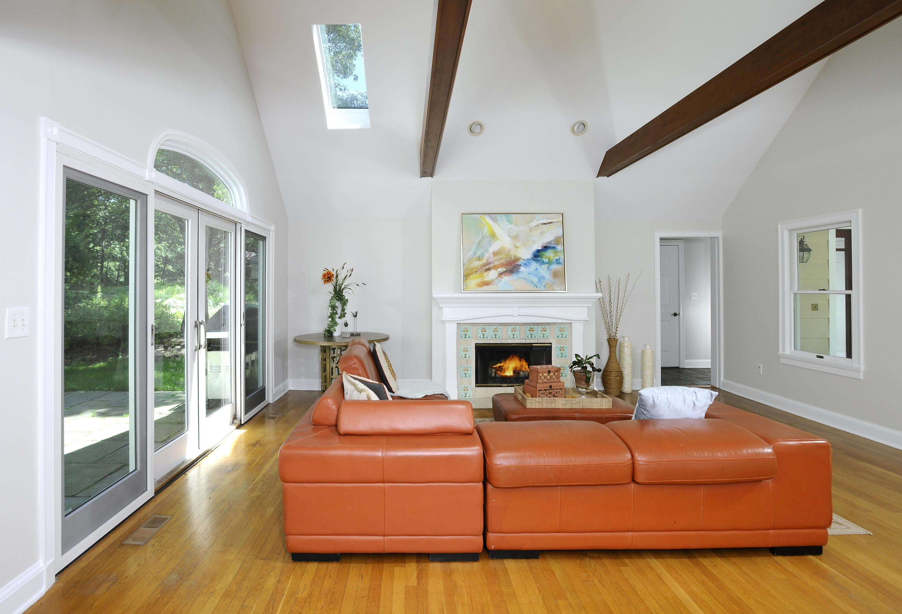 58 Locust Hill Road Darien, CT 06820 - Photo 8 of 21 a living room with furniture fireplace and flat screen tv