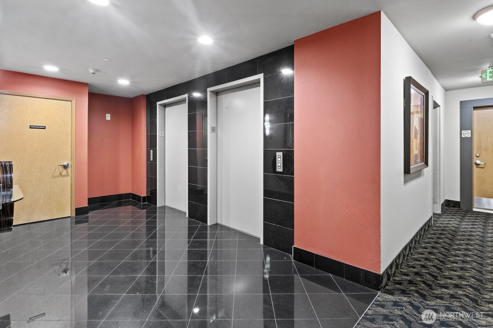 1125 East Olive Street, Unit 212 Seattle, WA 98122 - Photo 21 of 39 a view of hallway with stairs