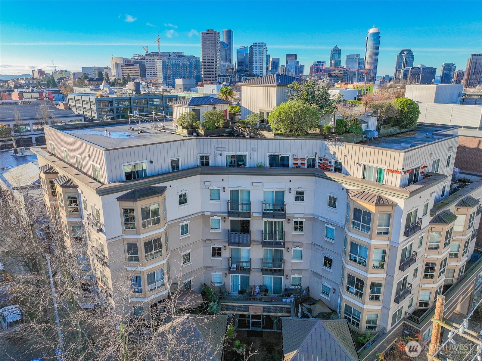 1125 East Olive Street, Unit 212 Seattle, WA 98122 - Photo 30 of 39 a tall building with a city view