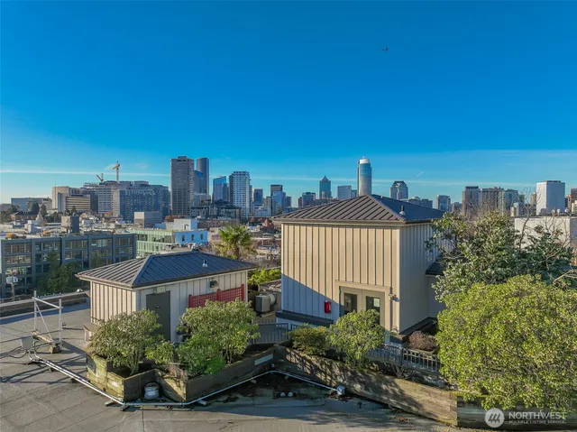 a view of a building with sitting area