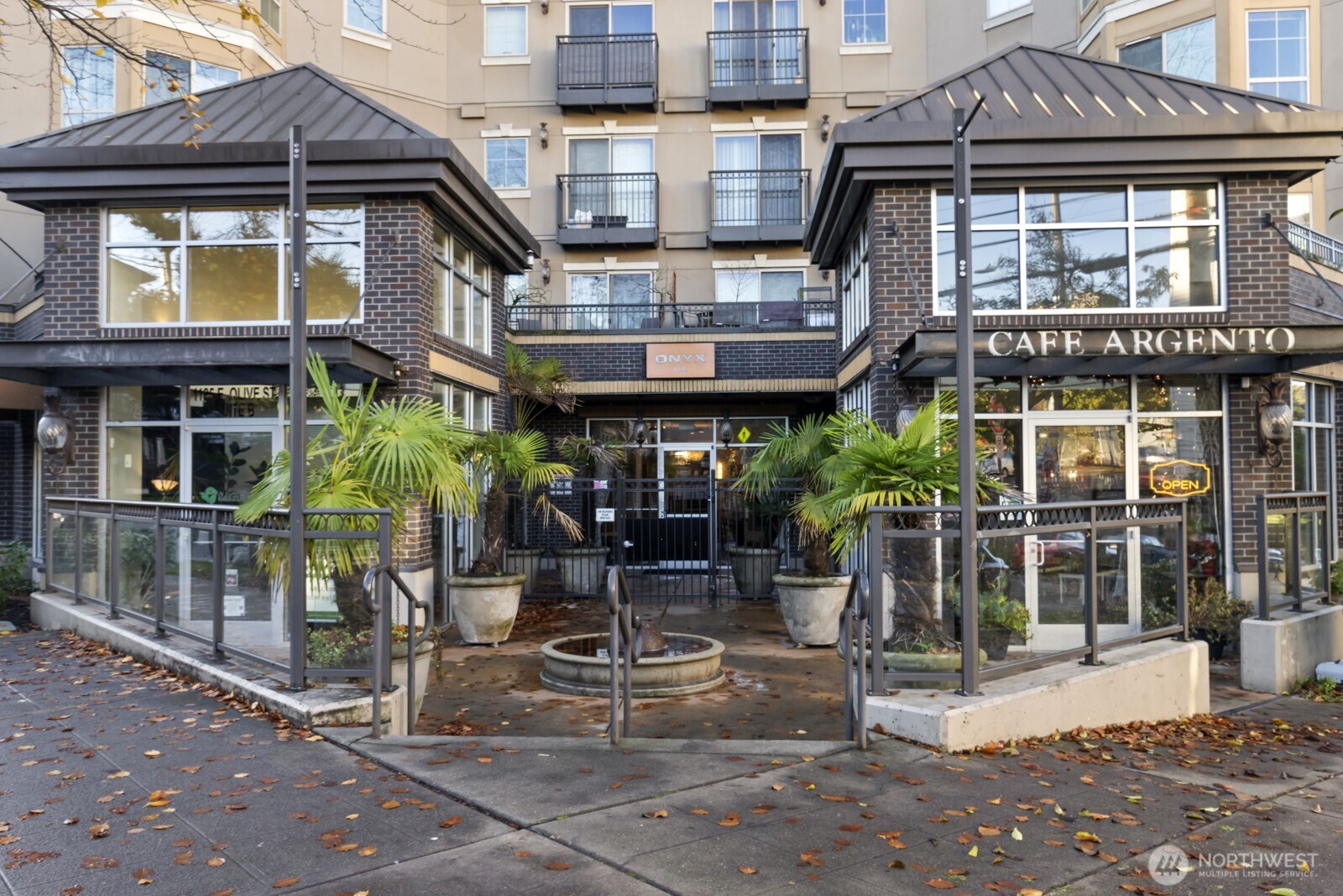 1125 East Olive Street, Unit 212 Seattle, WA 98122 - Photo 36 of 39 a view of a building with sitting area