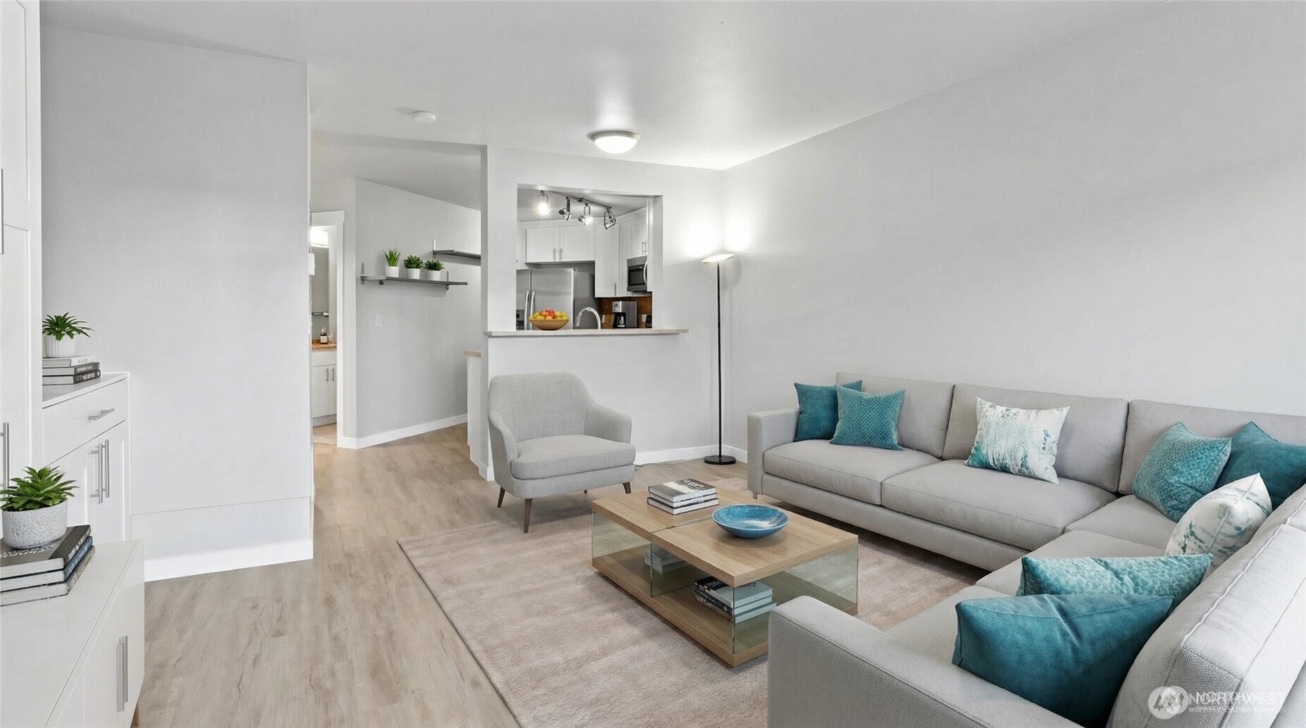 1125 East Olive Street, Unit 212 Seattle, WA 98122 - Photo 4 of 39 a living room with furniture and a couch