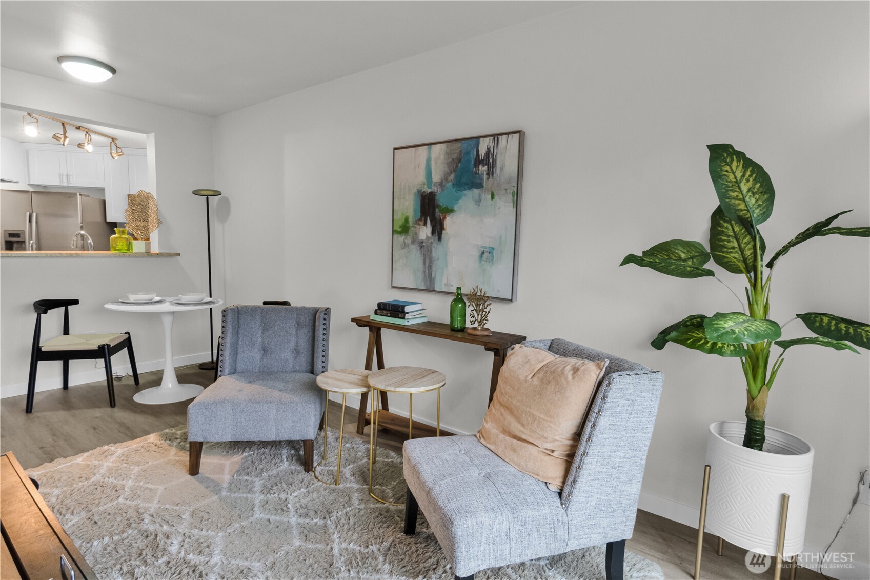 1125 East Olive Street, Unit 212 Seattle, WA 98122 - Photo 5 of 39 a living room with furniture