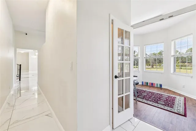 a workspace with furniture and wooden floor