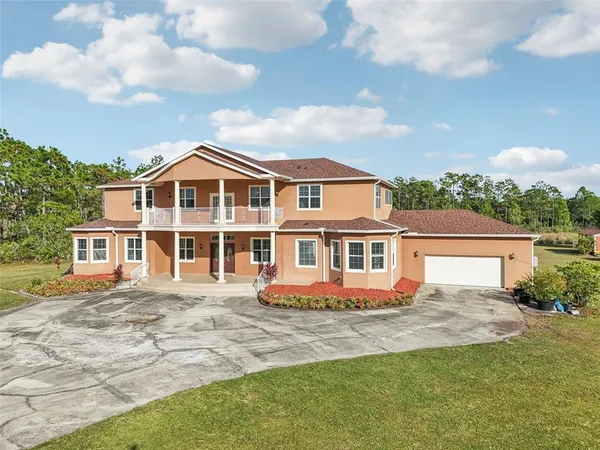 a view of a hallway with windows