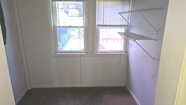 a view of a small space with a window