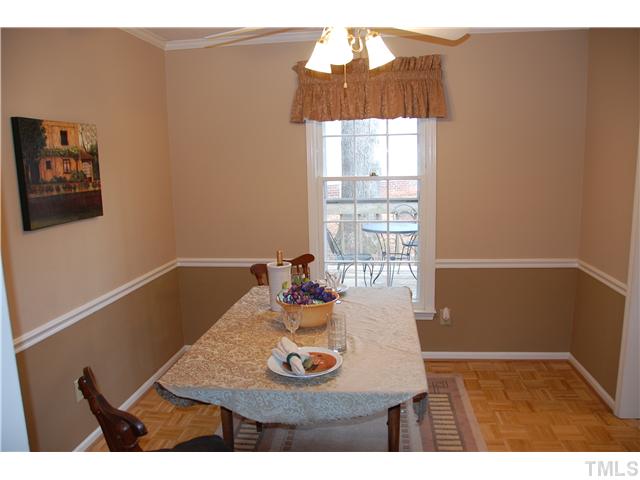 116 Wythe Circle Raleigh, NC 27615 - Photo 6 of 23 Dining room with views to deck and rear yard