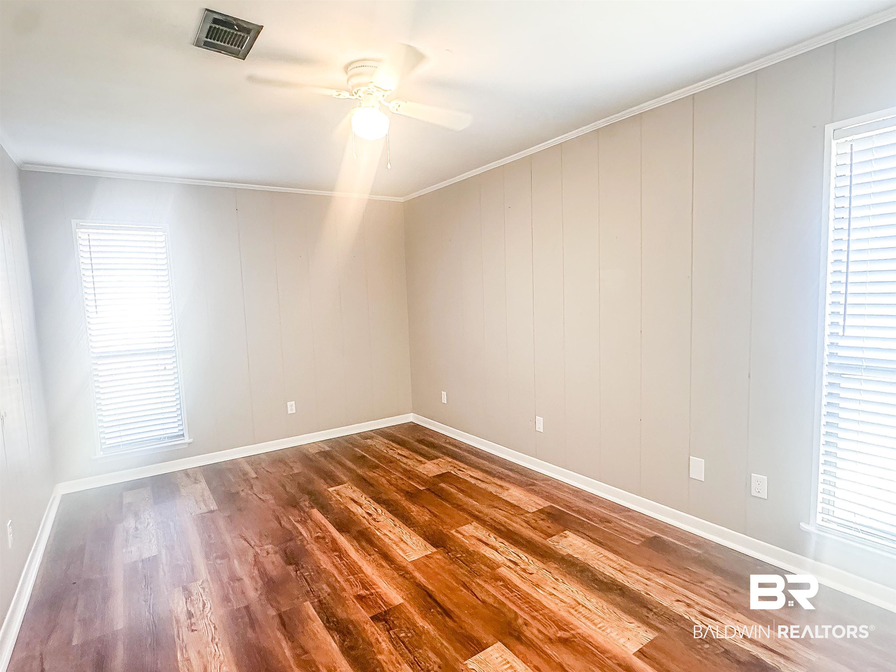 1104 North Pine Street Foley, AL 36535 - Photo 15 of 35 Bedroom 3 featuring ceiling fan, wood-type flooring, and crown molding