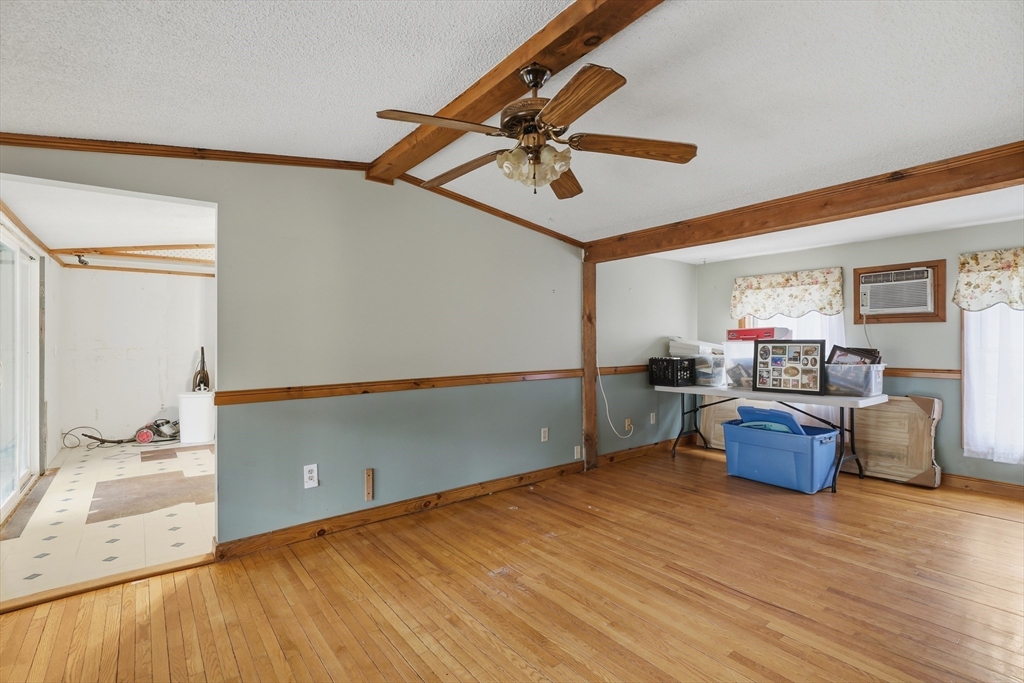 987 Patriots Road Templeton, MA 01468 - Photo 12 of 39 a living room with furniture and a wooden floor