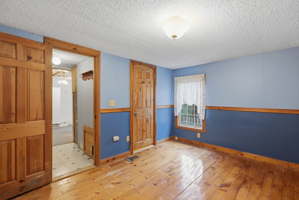 987 Patriots Road Templeton, MA 01468 - Photo 21 of 39 an empty room with windows and closet