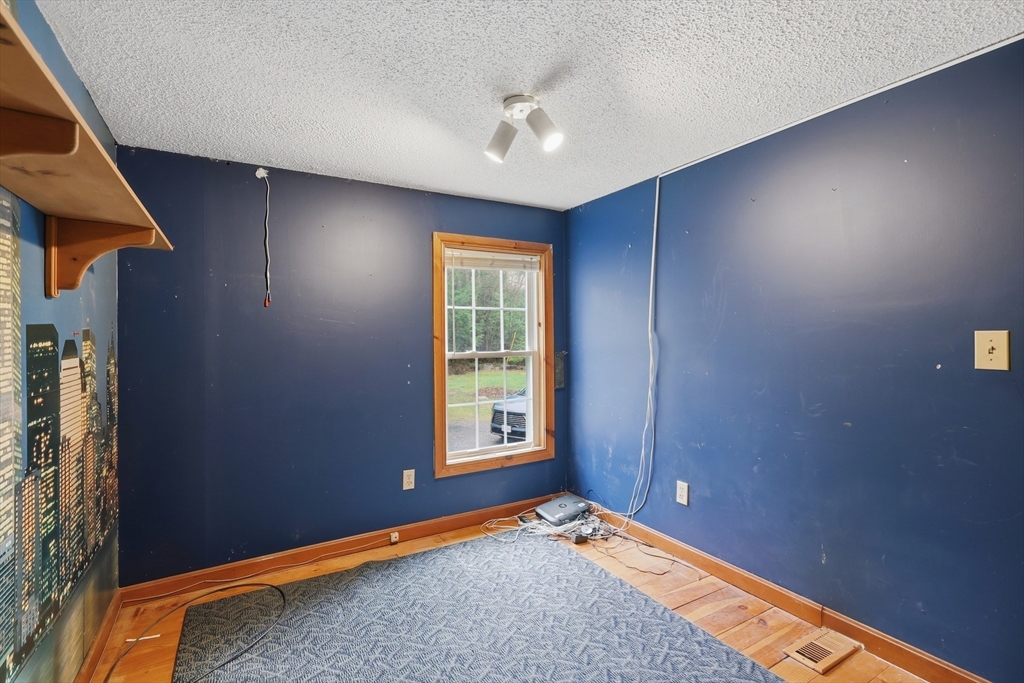 987 Patriots Road Templeton, MA 01468 - Photo 27 of 39 a view of an empty room with a window