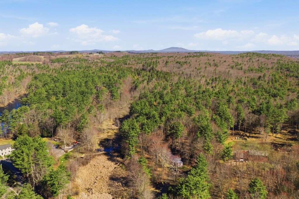 987 Patriots Road Templeton, MA 01468 - Photo 38 of 39 a view of a city with lush green forest