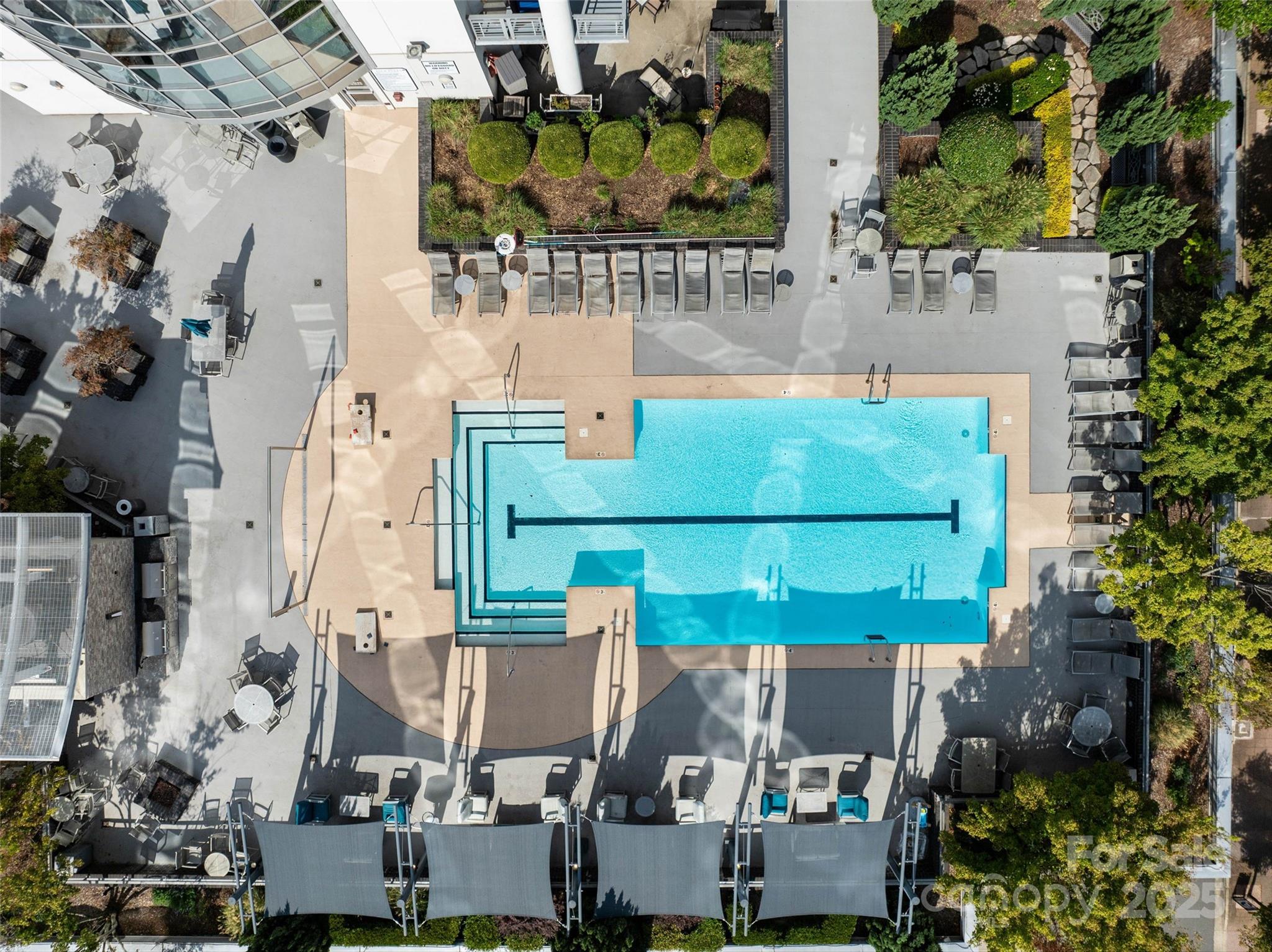 333 West Trade Street, Unit 1301 Charlotte, NC 28202 - Photo 27 of 34 an aerial view of a building with outdoor space