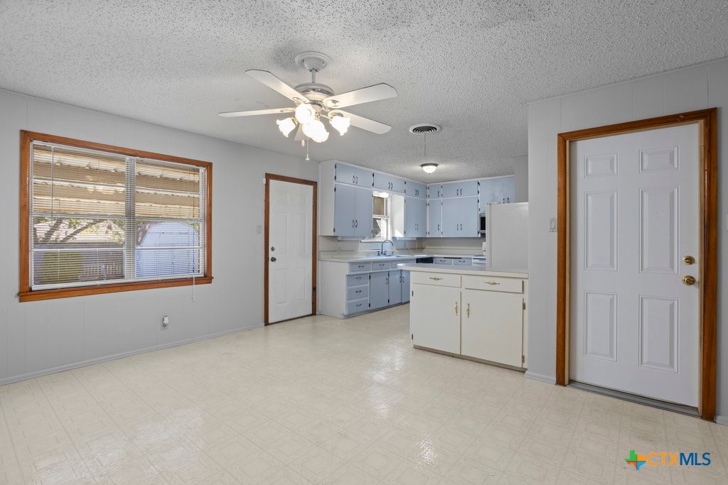 2014 South 47th Street Temple, TX 76504 - Photo 2 of 11 a view of a kitchen with closet and window