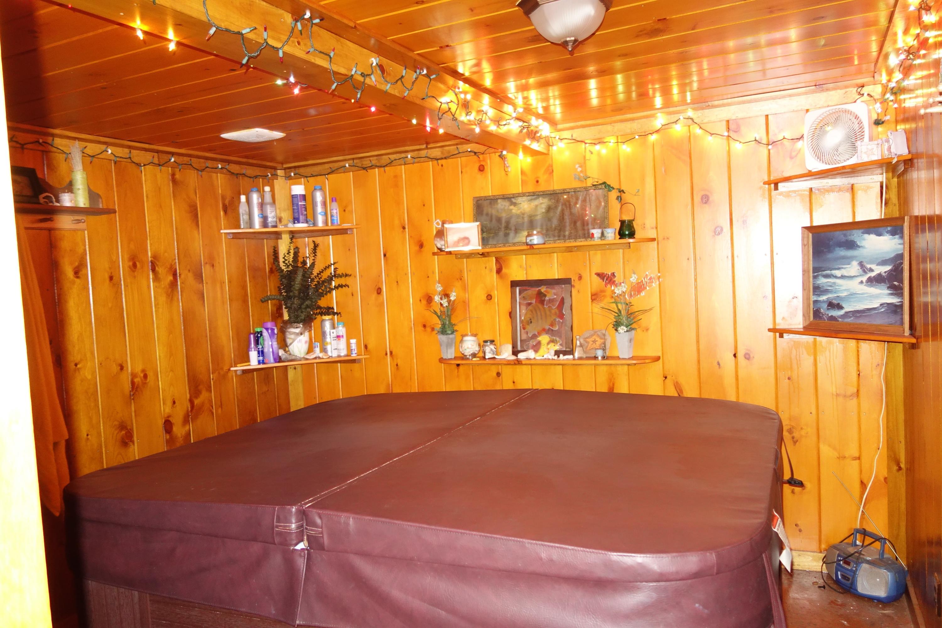 421 Roxbury Road Mexico, ME 04257 - Photo 10 of 40 hot tub off basement landing