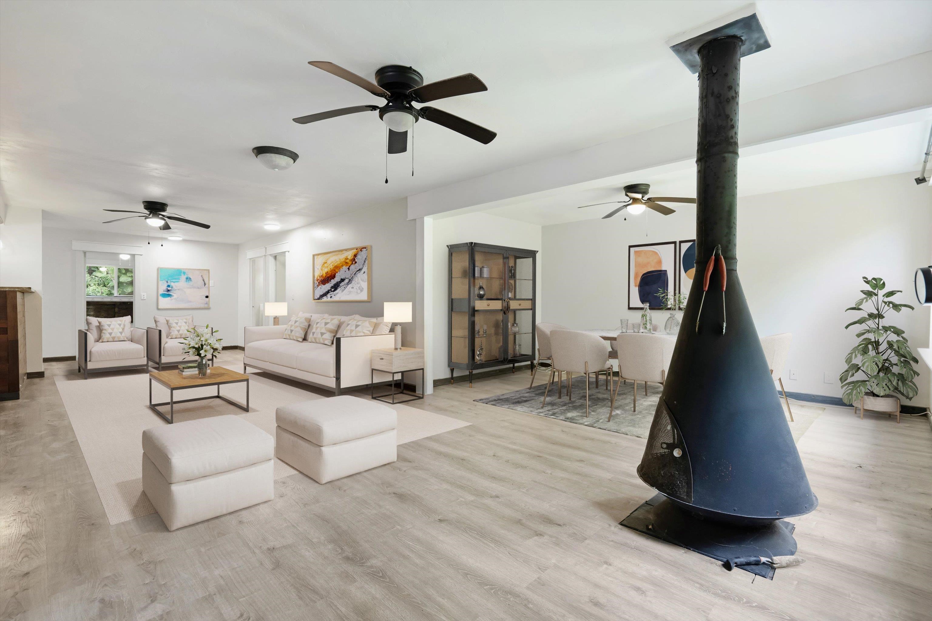 605 Kaupakalua Road Haiku, HI 96708 - Photo 39 of 44 a living room with furniture and a ceiling fan