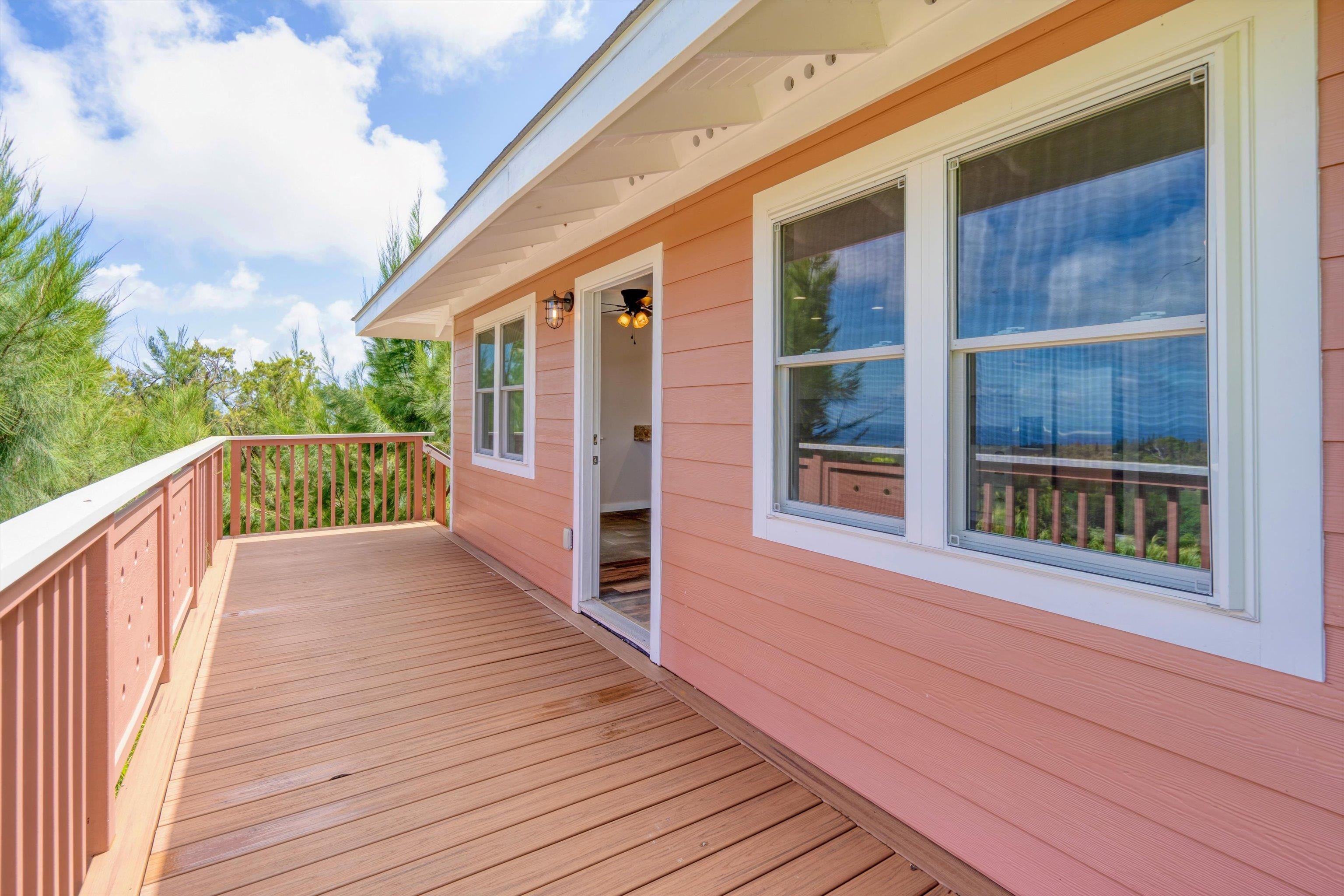 605 Kaupakalua Road Haiku, HI 96708 - Photo 4 of 44 a view of a house with a deck