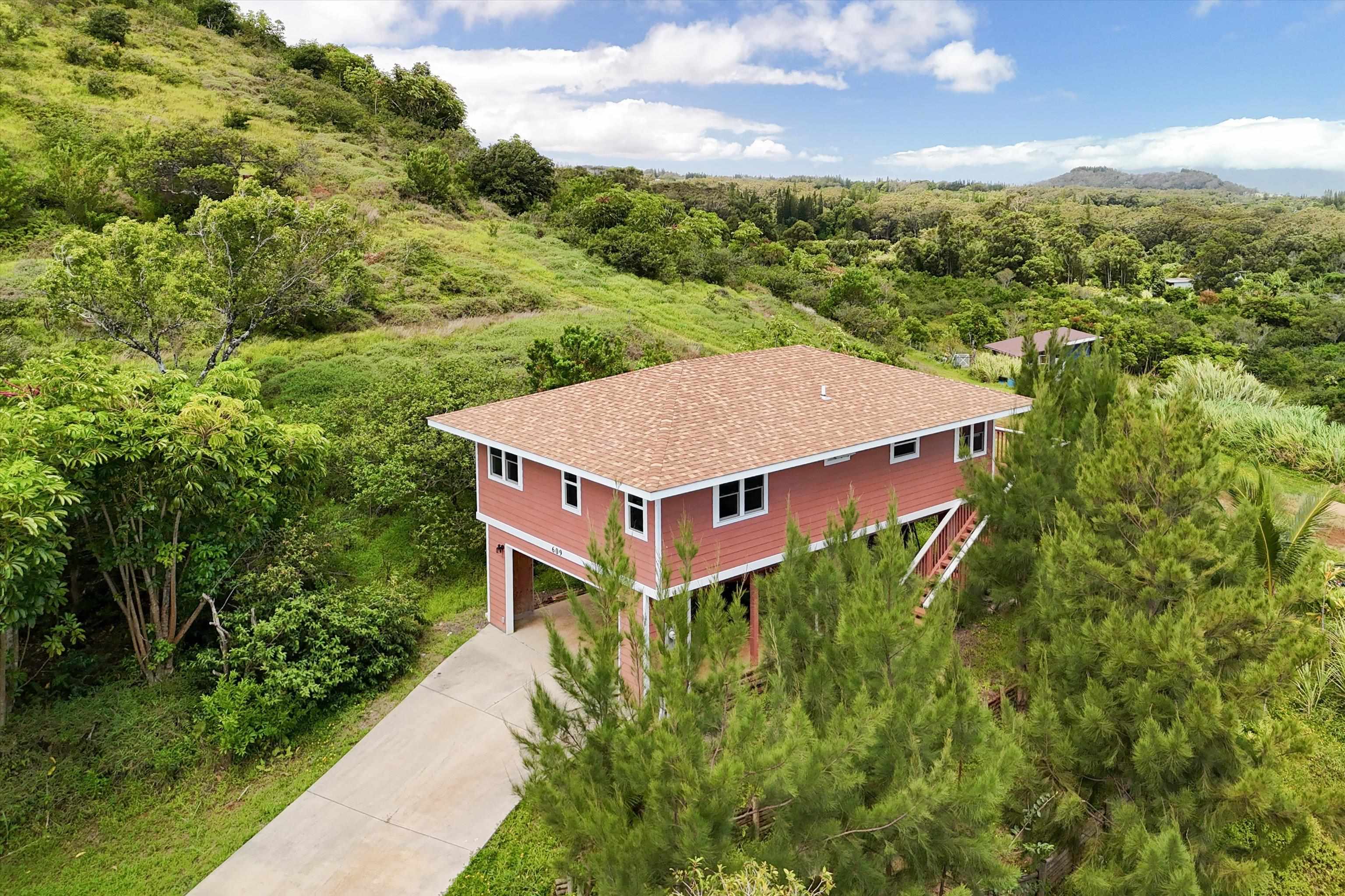 605 Kaupakalua Road Haiku, HI 96708 - Photo 44 of 44 an aerial view of a house with a big yard