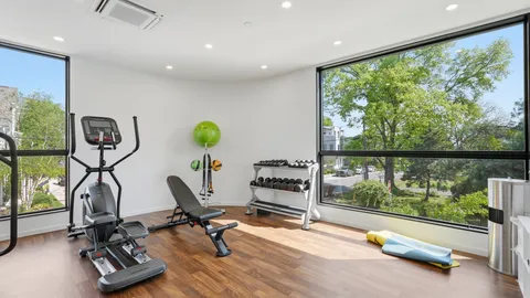a view of a room with gym equipment
