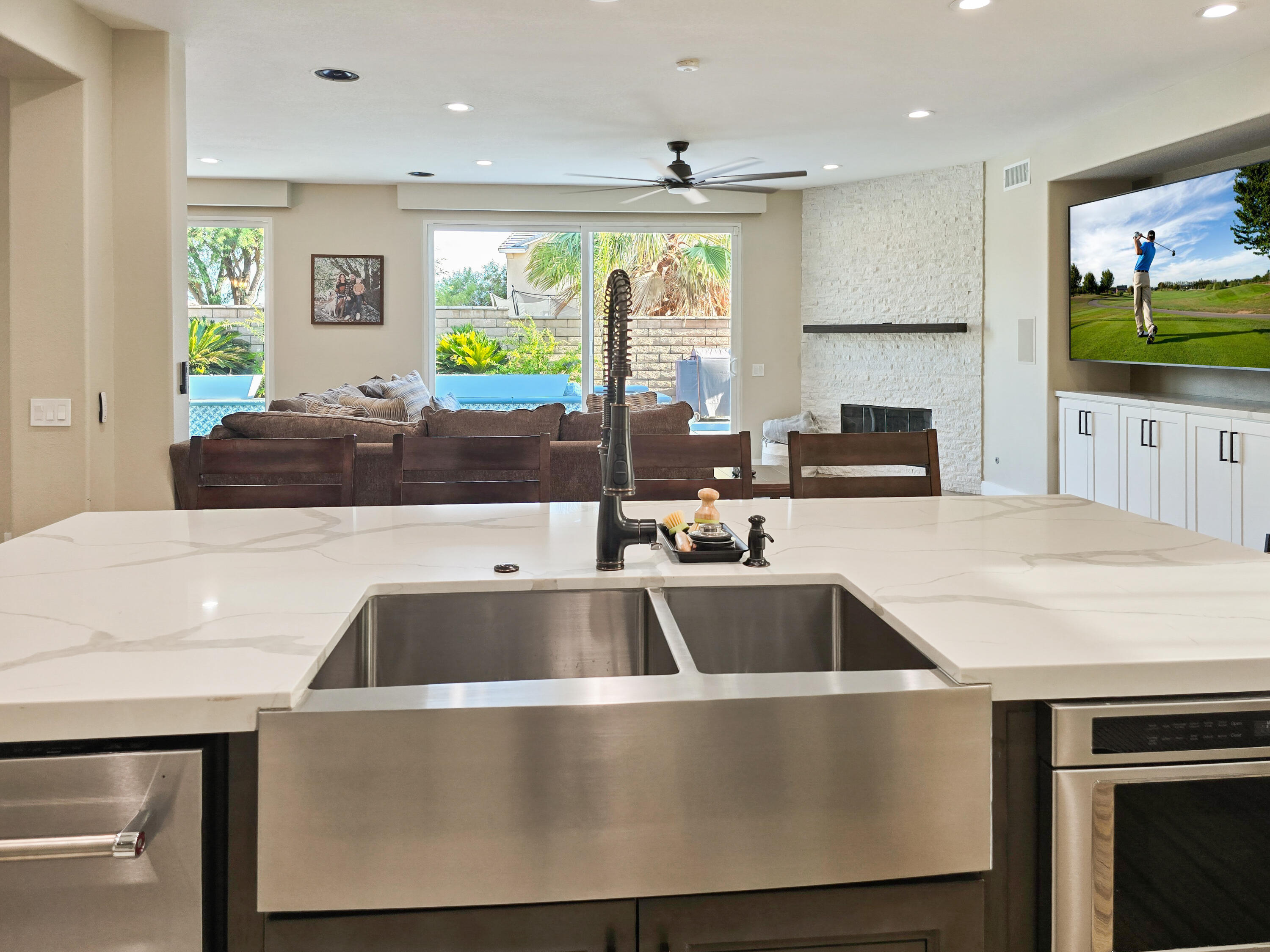80501 Denton Drive Indio, CA 92203 - Photo 14 of 42 a kitchen with kitchen island a sink and a large window