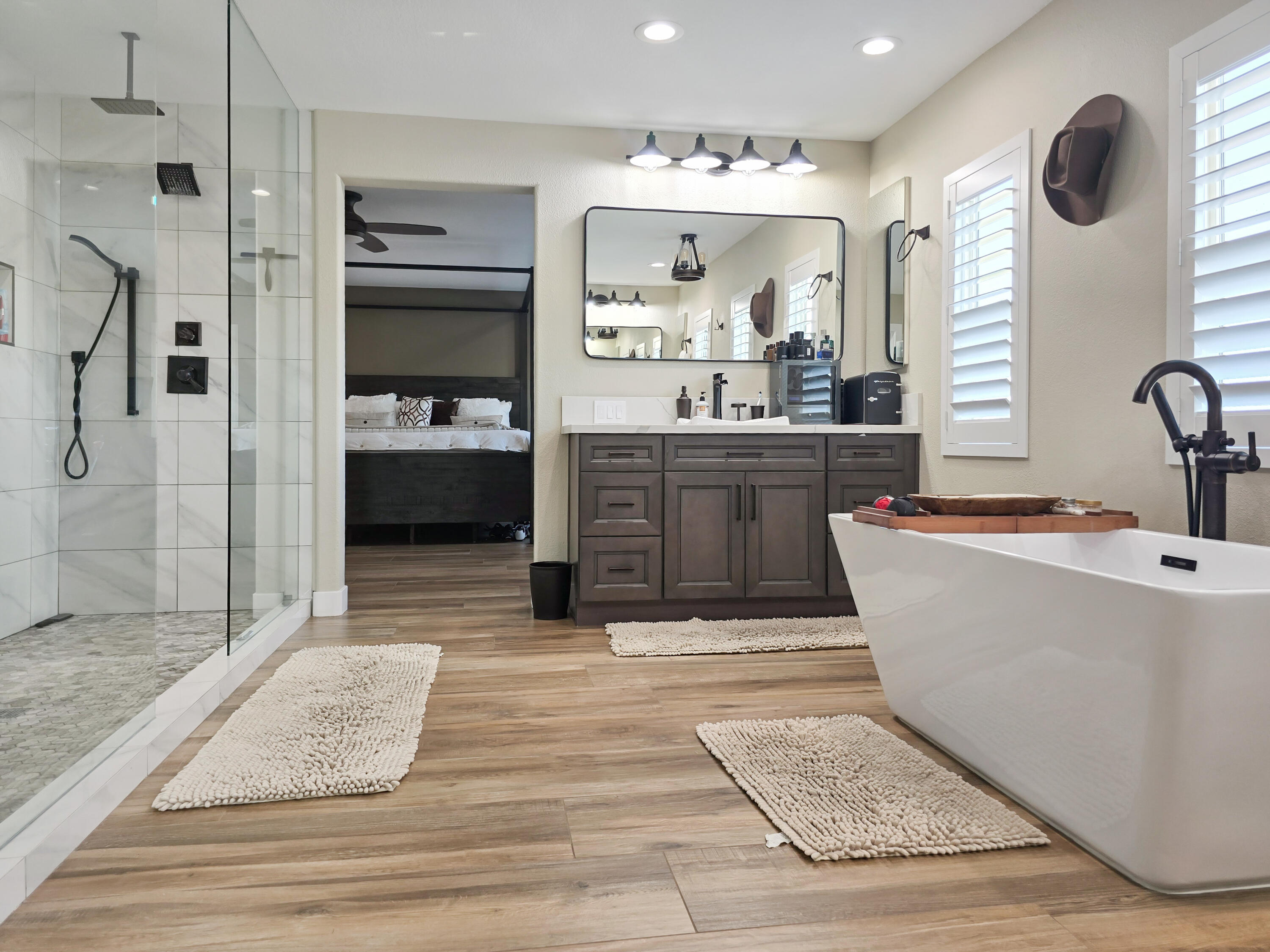 80501 Denton Drive Indio, CA 92203 - Photo 21 of 42 a large spacious bathroom with a tub sink shower and mirror
