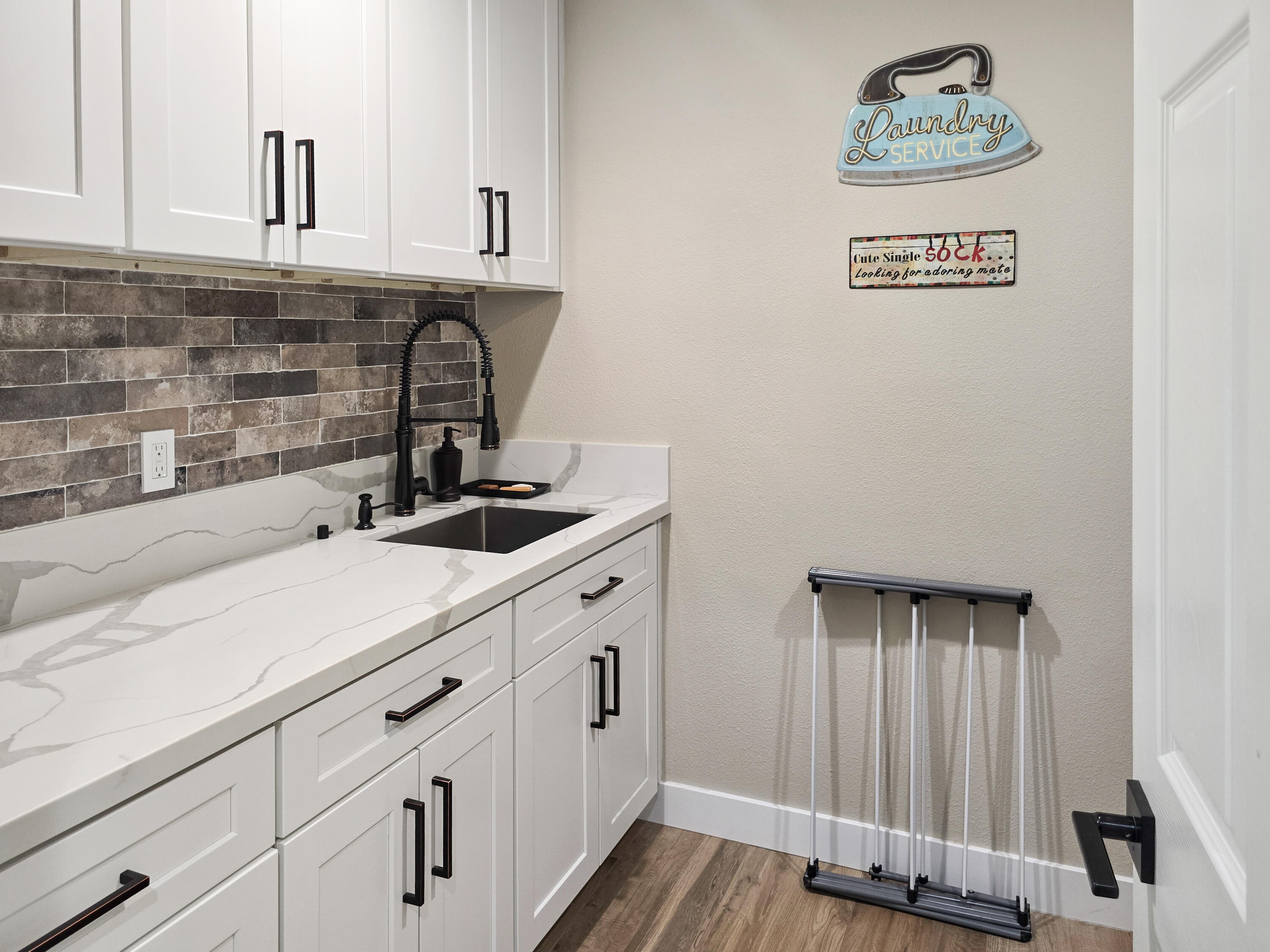80501 Denton Drive Indio, CA 92203 - Photo 24 of 42 a kitchen with a sink and cabinets