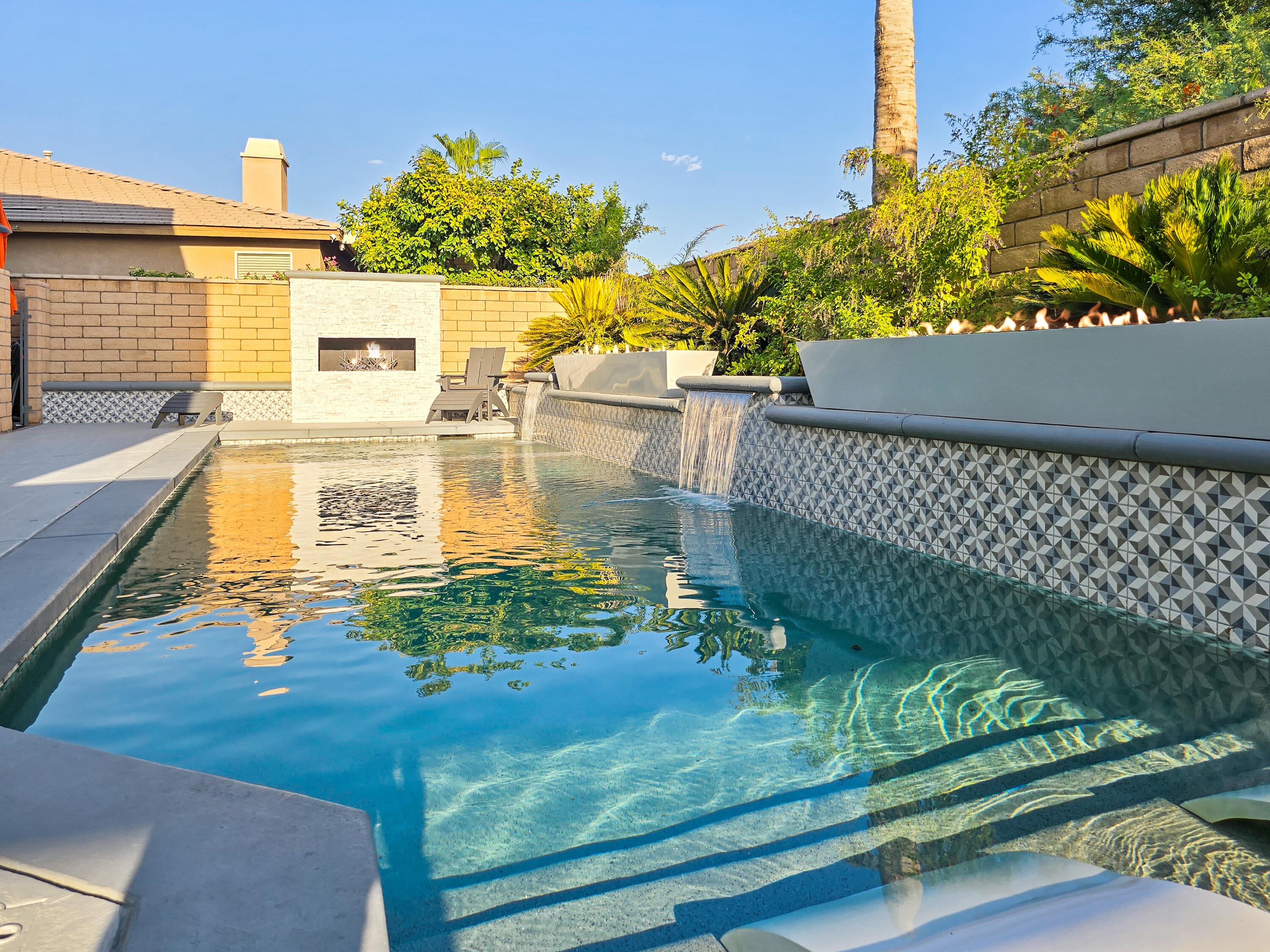 80501 Denton Drive Indio, CA 92203 - Photo 3 of 42 a view of a balcony with floor to ceiling windows with wooden floor