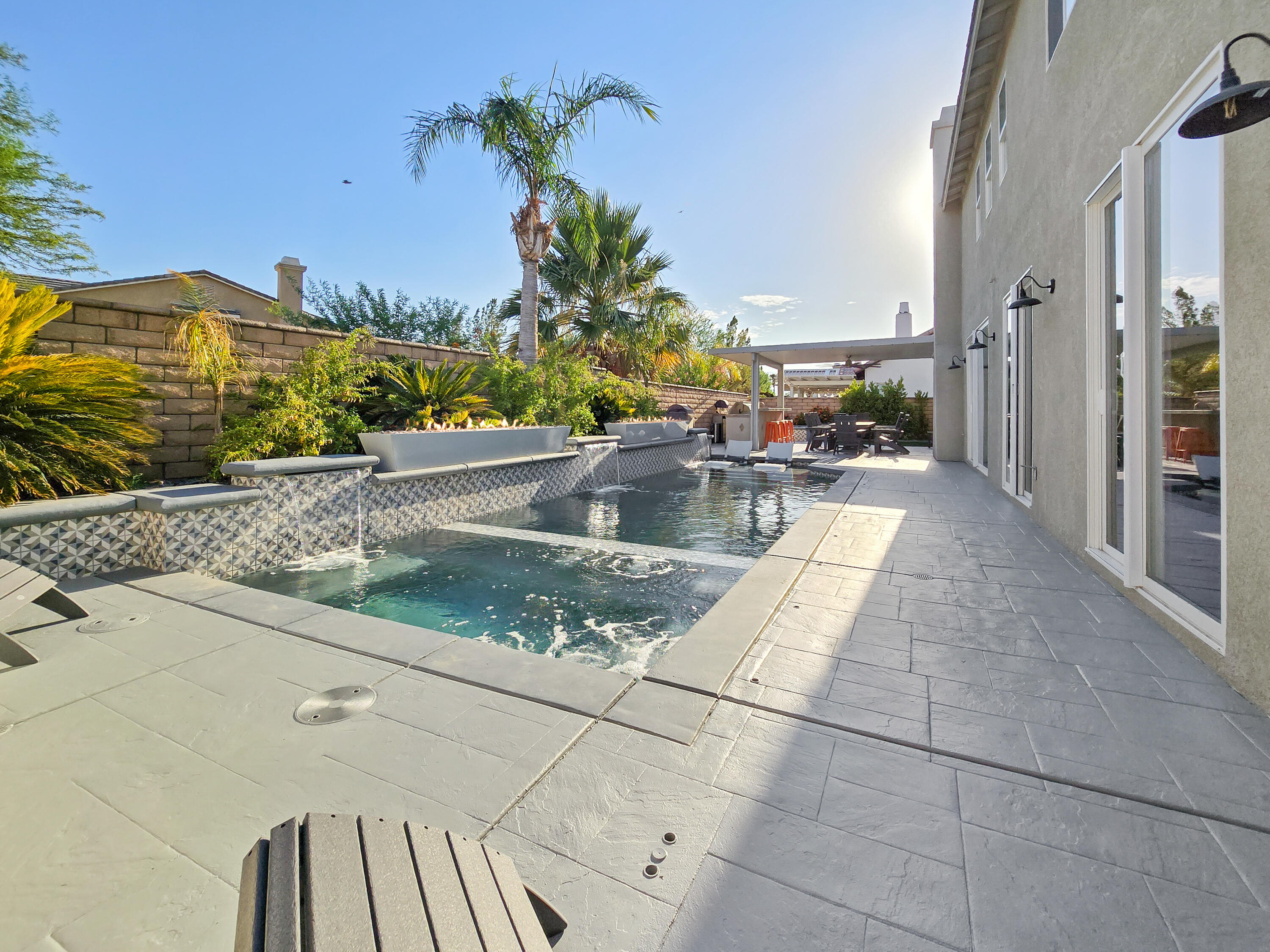 80501 Denton Drive Indio, CA 92203 - Photo 34 of 42 a view of swimming pool with outdoor seating and plants