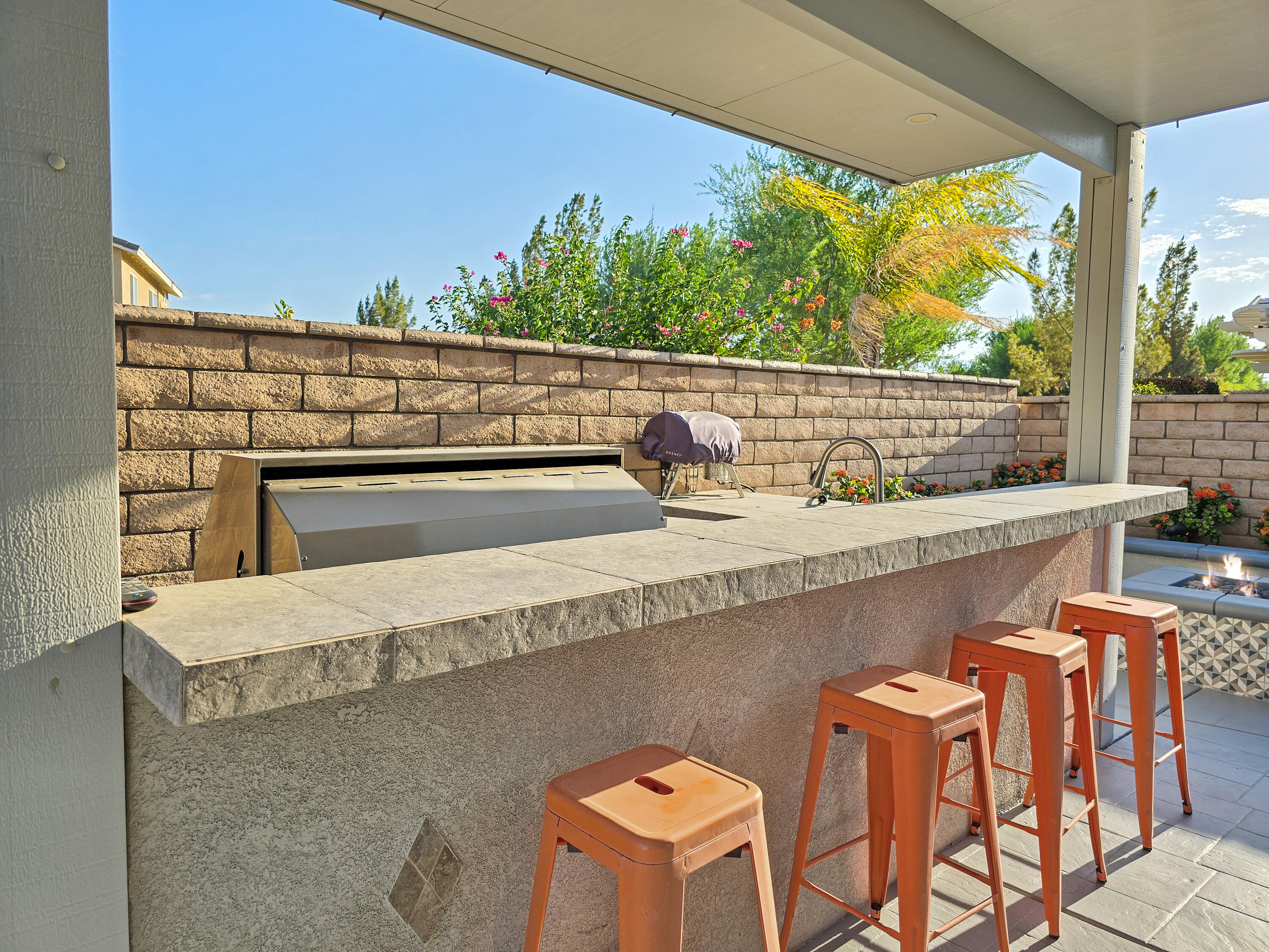 80501 Denton Drive Indio, CA 92203 - Photo 36 of 42 a kitchen with a table and chairs in it