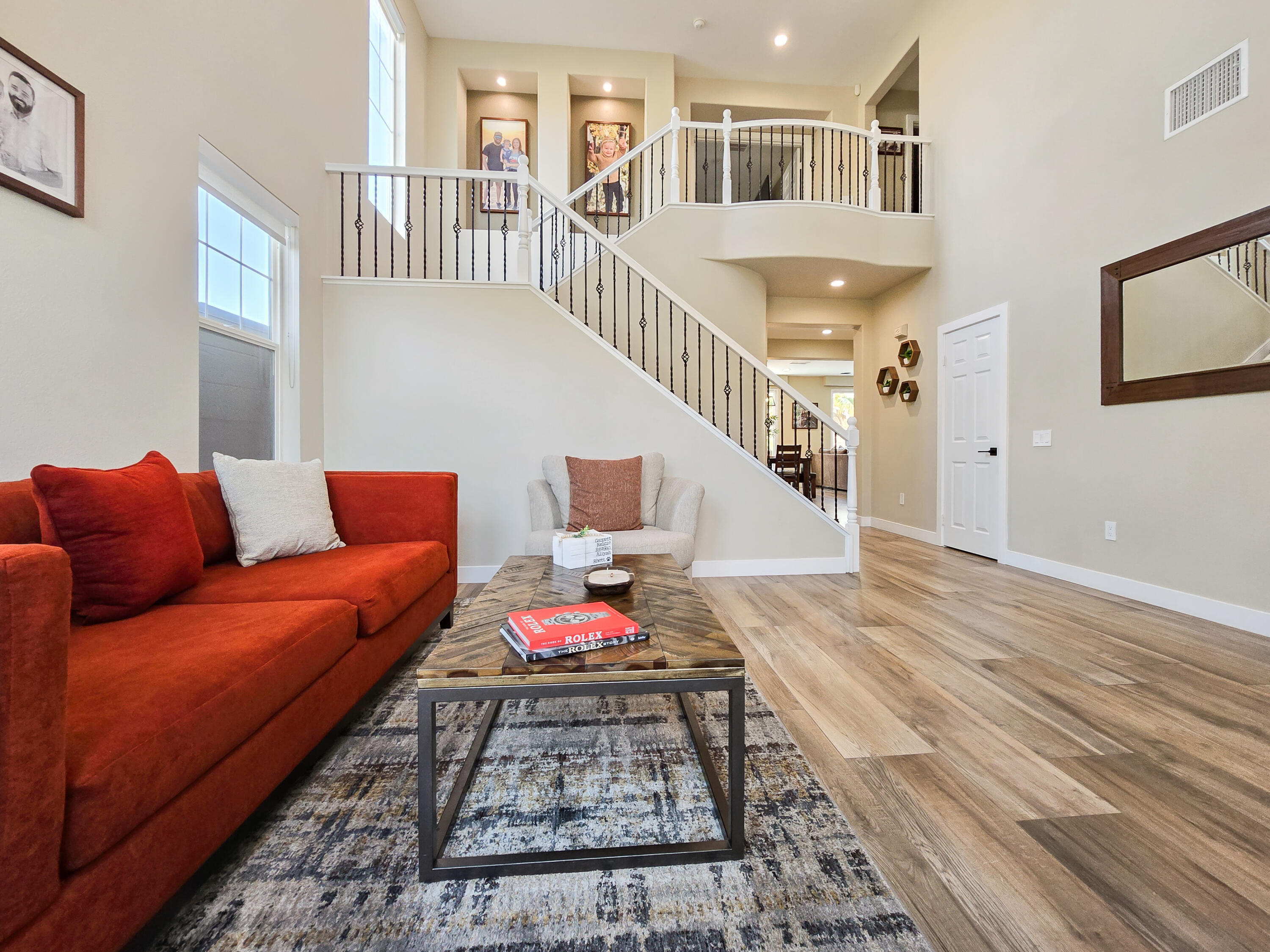80501 Denton Drive Indio, CA 92203 - Photo 7 of 42 a living room with furniture and stairs