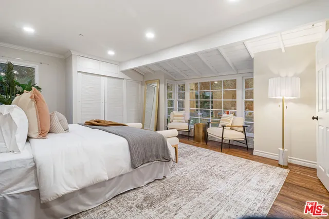 a bathroom with a sink a vanity and a mirror