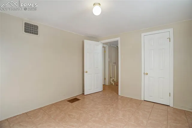 a bathroom with a sink a vanity and a mirror